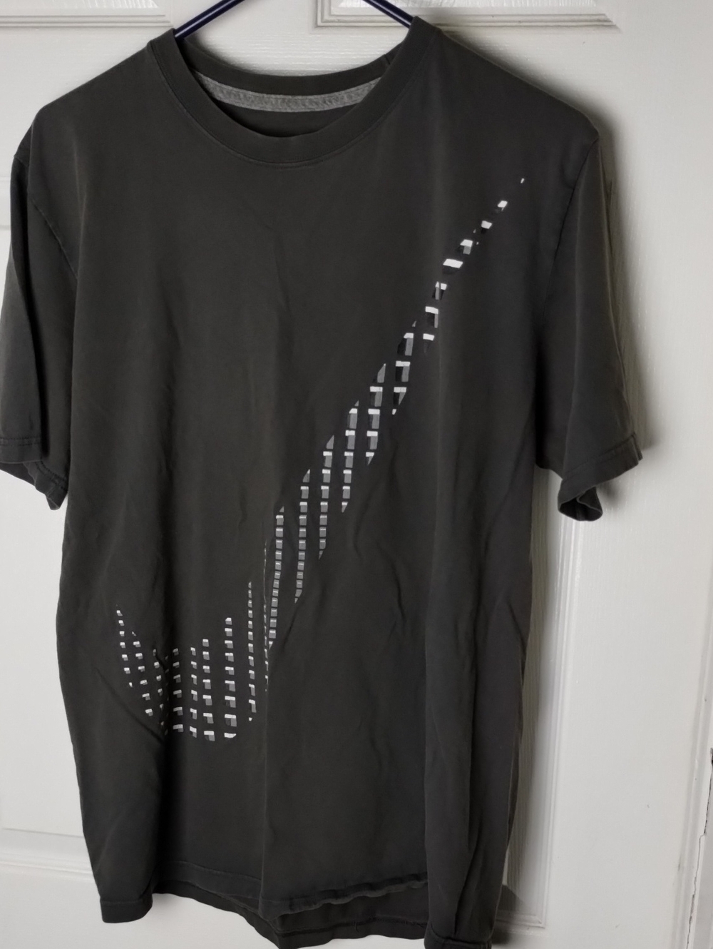 Nike Black Short-Sleeve Tee with Silver Swoosh Cutout